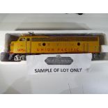 Model Railways - two diesel O gauge locomotives and three coaches in playworn condition comprising