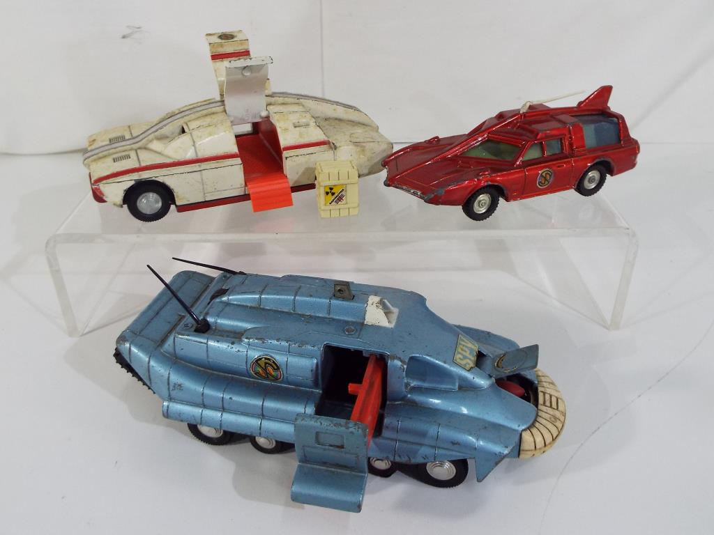 Dinky - three unboxed and playworn diecast models by Dinky Toys to include #105 Maximum Security