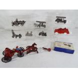 Nine vintage fire engine related models, predominantly horse drawn,