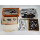 Two OO gauge white metal model kits of locomotives with motors including an SR 0-6-0 terrier tank