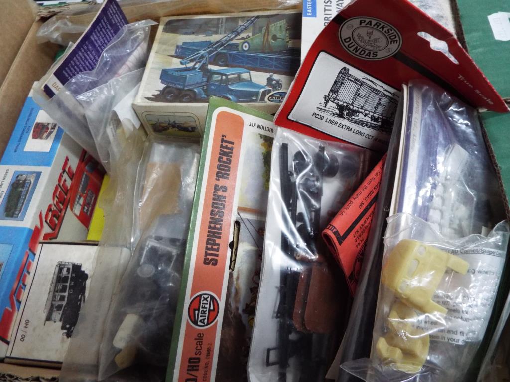 A good mixed lot to include 4 mm white metal model vehicle kits, scenics kits, Wills, Ratio,