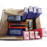 Model Railways - A quantity of boxed model railway accessories and carriages to include Hornby