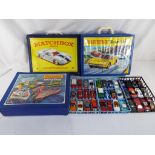 Matchbox - three collector's cases, one containing 36 cars, the other two empty,