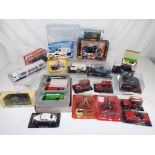 Corgi, Vitesse, Cararama and others - in excess of 20 diecast vehicles in original boxes,