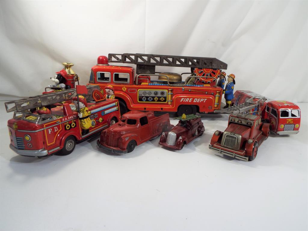 Metalcraft, Timpo and others - five tin-plate fire engines, three friction powered plus two others,