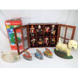 Three tinplate novelty irons and a serving tray, a Douglas Fir Dancing novelty Christmas Tree,