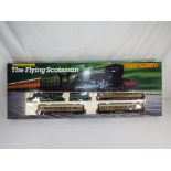 Model Railways - a OO gauge Hornby electronic train set entitled The Flying Scotsman 4472 LNER,