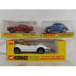 Dinky and Corgi - A Dinky # 129 Volkswagen De Luxe Saloon in blue with white interior contained in
