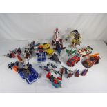 Transformers / Tranships - a quantity of vintage Transformers to include police vehicles, planes,