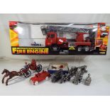 A large battery operated fire engine with sound and lights by Everbright,