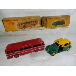Dinky Toys - two diecast models comprising a Duple Roadmaster Coach painted in red with silver