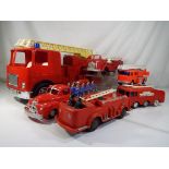 Six plastic fire engines comprising a Telsalda Airport crash tender, Mettoy battery powered engine,