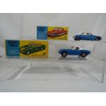Corgi - Lot to include a Corgi Toys # 319 Lotus Elan Coupe with detachable chassis in blue with