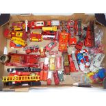 Fire Engines - In excess of thirty diecast and tinplate fire engines,