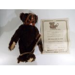 Steiff - A limited edition dark brown mohair Steiff Muzzle Bear,