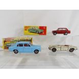 Dinky - Lot to include a Dinky # 162 Triumph 1300 in light blue with red interior,