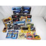 Corgi, Onyx, Cararama and others - in excess of twenty diecast vehicles in original boxes,
