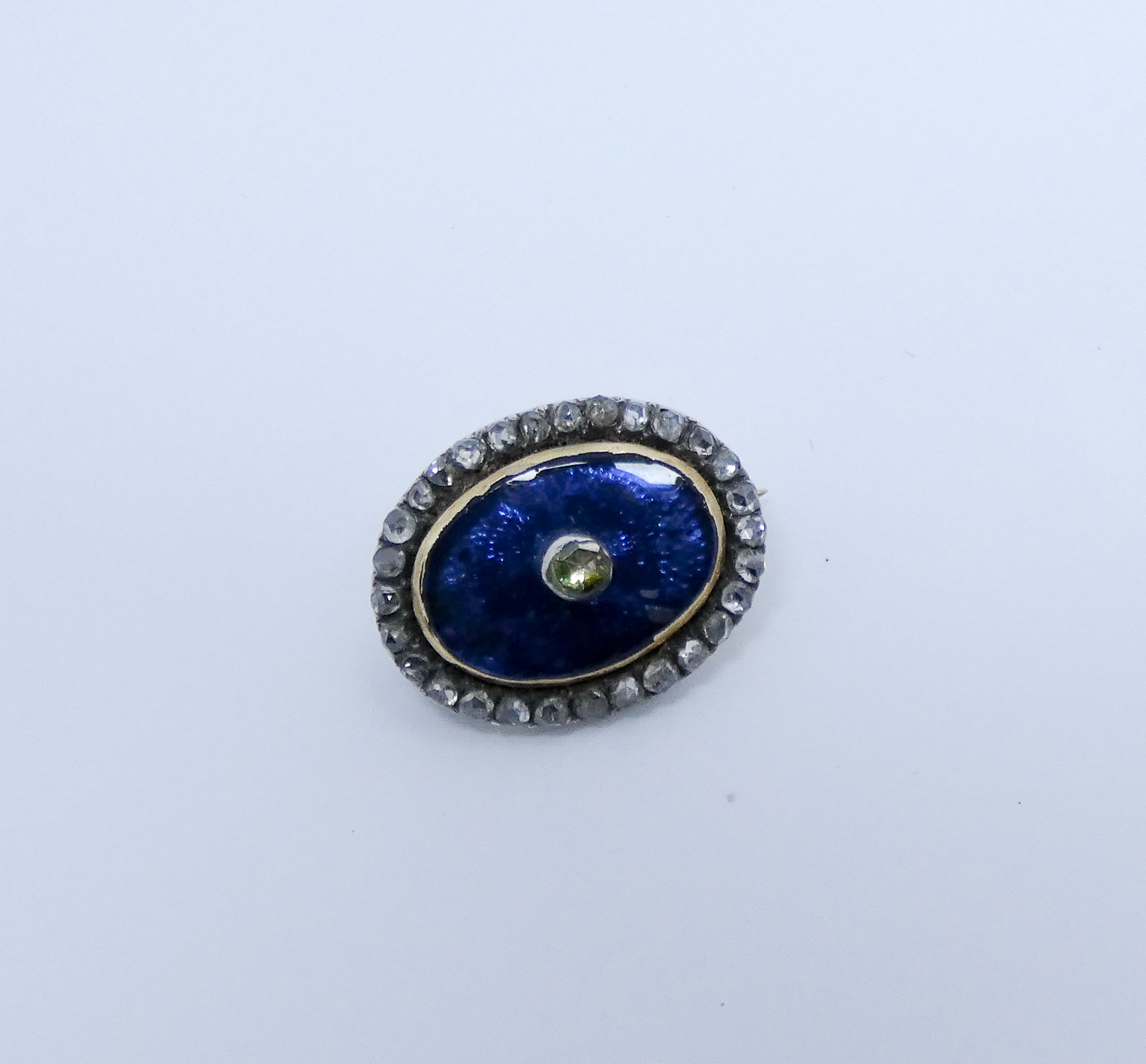 19th Century oval diamond and enamel brooch, 2cm long set in gold weight 4.