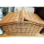 A lift top wicker picnic hamper made for or by Land Rover