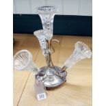 A silver plated four trumpet pressed glass epergne