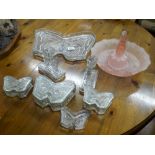 Various butterfly shaped glass dishes,