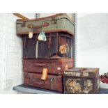 Five old assorted leather suitcases