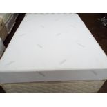 A 5' thick based divan with Tempur mattress