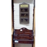 A wooden letter rack and brass embossed letter rack together with a book slide and lacquered press