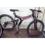 A Salcano black and silver mountain bike with full suspension