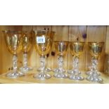 Ten matching amber wine glasses and eight tumblers