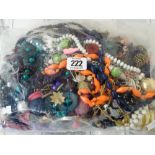 A large quantity of assorted beads and costume jewellery