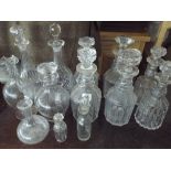 Thirteen assorted glass decanters