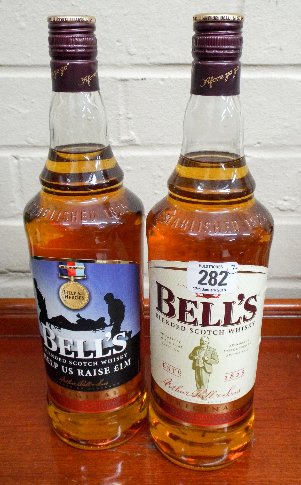 Two one litre bottles of Bells Scotch Whisky