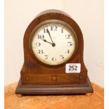 An Edwardian mantle clock in inlaid mahogany case