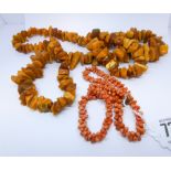 Baltic amber chip bead necklace and a coral bead necklace