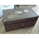 An old trunk with Cunard stickers labelled 'Lucitania sailing from New York to Southampton'