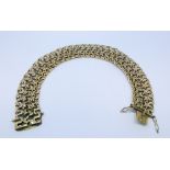 A Victorian yellow metal flexible bracelet un-hallmarked but tests as 9ct yellow gold 27.