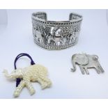 Wide sterling silver bangle with elephant motif,