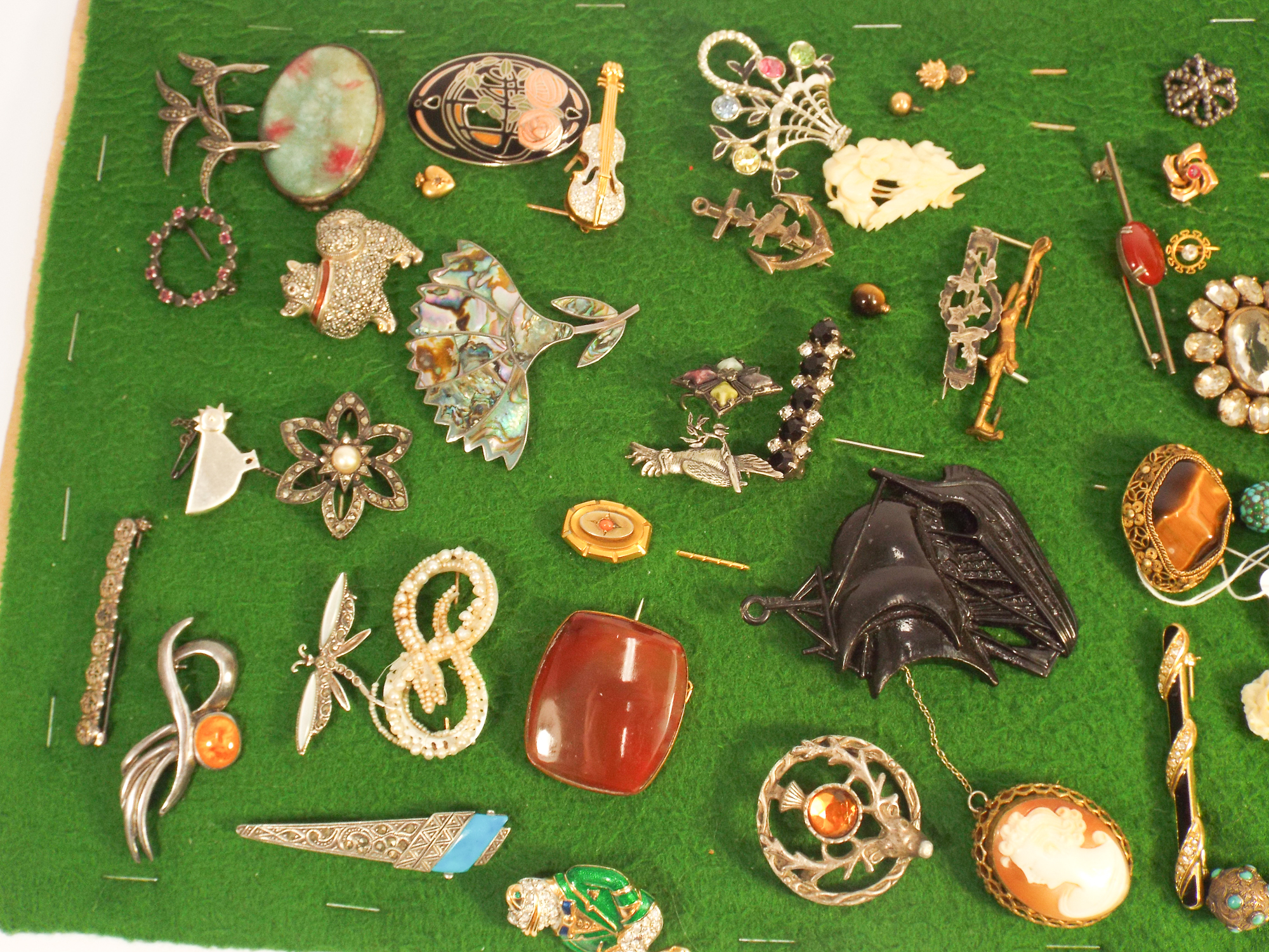 A collection of 19th century and later brooches and stick pins, some silver, some gold, - Image 4 of 4