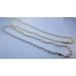 A row of cultured pearls with 9ct yellow gold bead clasp,