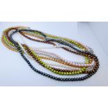 Seven strands of coloured cultured pearls with silver fittings