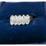 A 14ct yellow gold ten stone diamond dress ring,