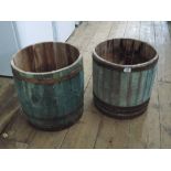 Two barrel shaped garden planters