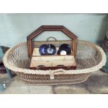 A large wicker basket or crib,(170cms long x 67cms wide,