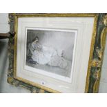 A gilt framed Russell Flint print of a young lady on chaise longue,