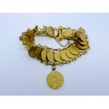 A middle eastern gold coin set bracelet in the Egyptian taste, each token marked in Arabic 21,