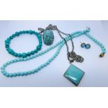 A collection of turquoise jewellery to include 9ct gold ear studs, bead necklace, dress ring,