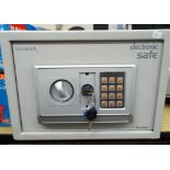 A Micromark electronic safe with key and combination