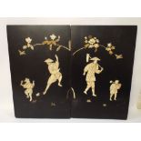 A pair of Chinese black lacquered bone figure decorated wall plaques