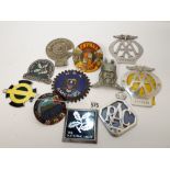 A collection of eleven car badges and mascots to include, British field sports, The National Trust,